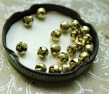Load image into Gallery viewer, Tiny Bright Gold Bells - 6mm Primitive Christmas Jingle Bells - Dollhouse Holiday Trim Miniatures 1/4 Inch Bell Trim for Decorating
