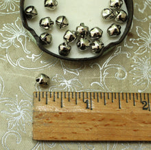 Load image into Gallery viewer, Tiny Bright Silver Bells - 6mm Primitive Christmas Jingle Bells - Dollhouse Holiday Trim Miniatures 1/4 Inch Bell Trim for Decorating
