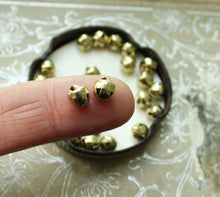 Load image into Gallery viewer, Tiny Bright Gold Bells - 6mm Primitive Christmas Jingle Bells - Dollhouse Holiday Trim Miniatures 1/4 Inch Bell Trim for Decorating