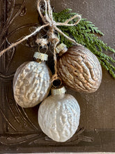 Load image into Gallery viewer, 12 days of Christmas 3 Glass Walnut Ornaments on Jute Strings
