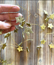 Load image into Gallery viewer, 74 Gold Glitter Stars Garland - 6 Feet Holiday Decorating Garland - Tiny Wired Gold Stars Glittery Christmas Garland
